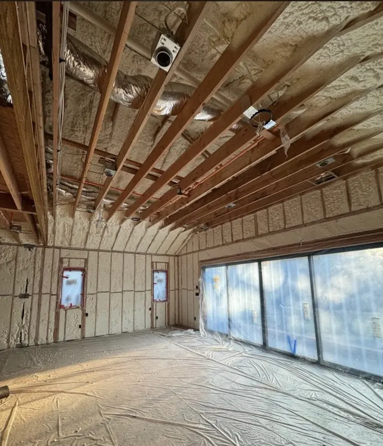 Interior walls and ceiling insulated with spray foam during new construction in Waipahu